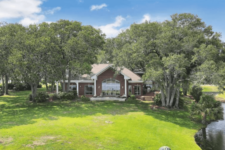 exterior view of a vacation rental home by the water