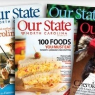 a pile of our state magazine | Sunset Vacations