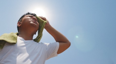 man experiencing heat exhaustion | Sunset Vacations